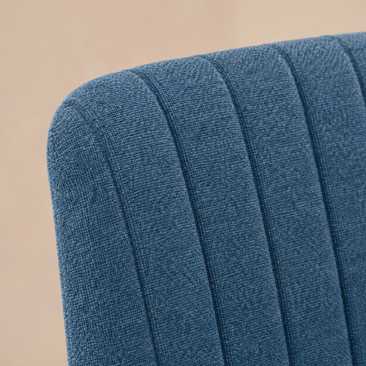 Close view of dusty blue MiraForm upholstery