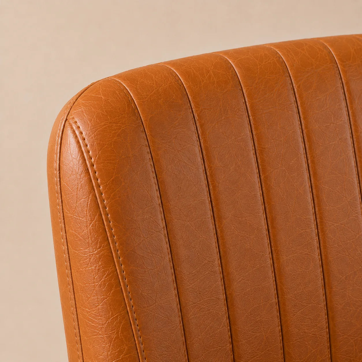 Close view of caramel MiraForm upholstery