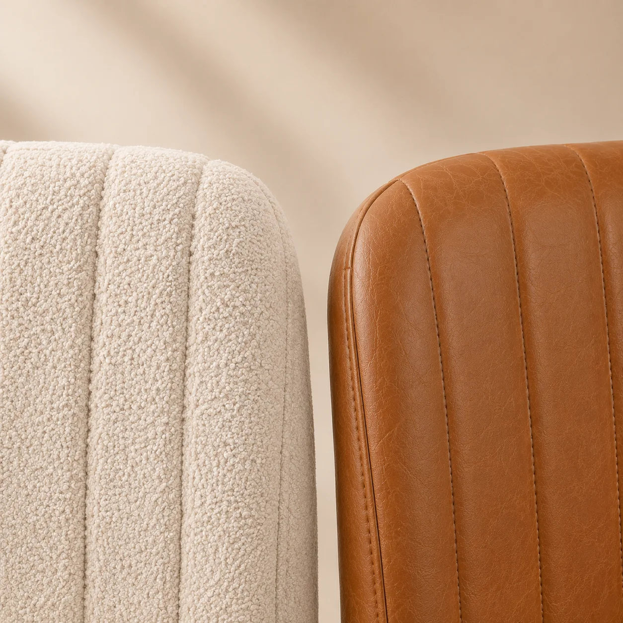 Close view of cream textured upholstery and caramel faux-leather upholstery