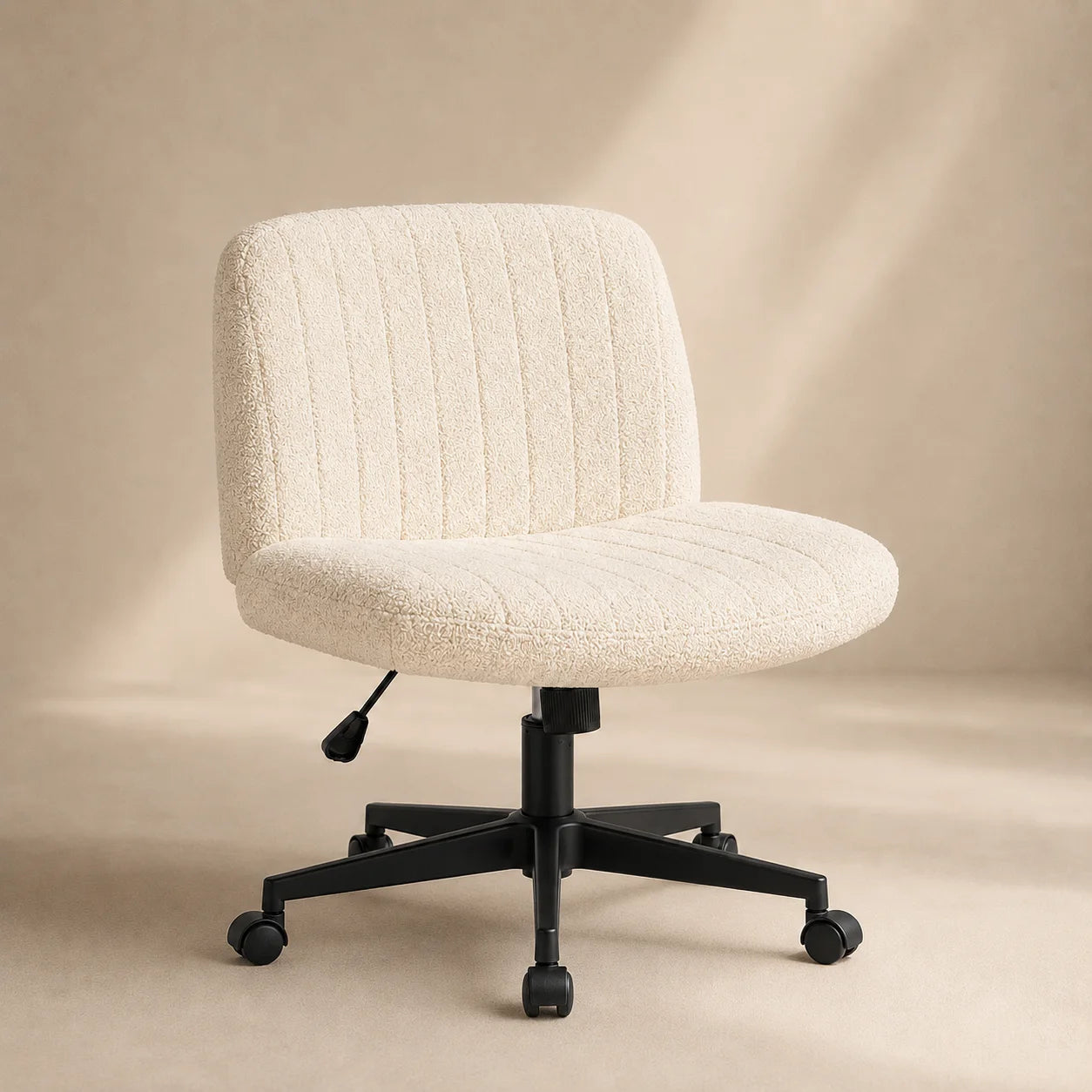 Cream MiraForm armless criss-cross swivel chair with rolling casters
